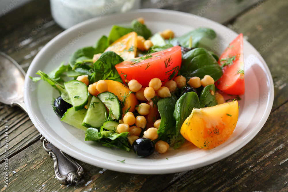 Vegan salad with tomatoes and chick pea
