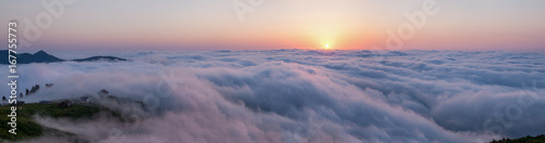 View from above the clouds, Gomi mountain. Sunset over clouds