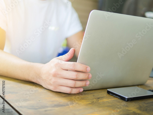 Business man working laptop on wood table