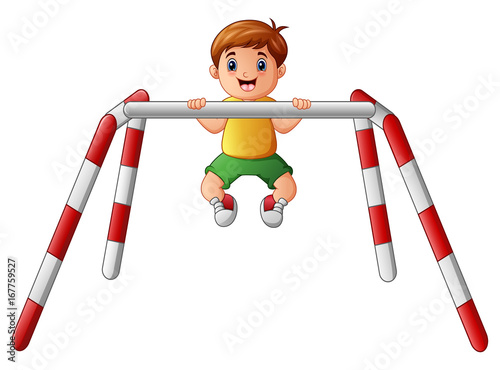 Little boy doing pull ups 