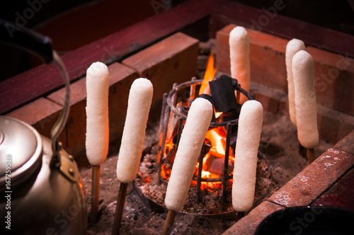 Charcoal grilled Kiritanpo, Local food of Akita, Tohoku, Japan photo