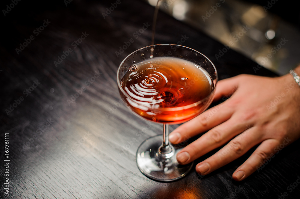 bartender making relaxing cocktail at the bar background noface bartender making relaxing cocktail at the bar background noface