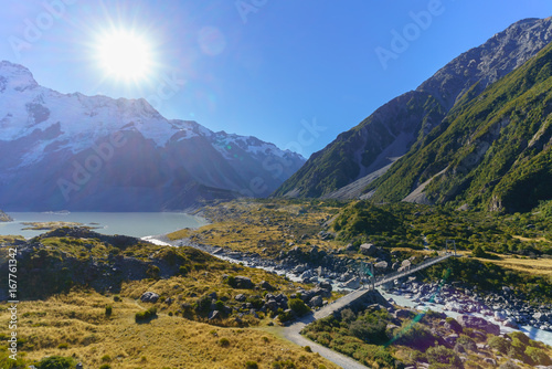 Suspension bridge over Hooker River upstream of Mueller Glacier lake , Hooker valley walking track within the Aoraki/Mount Cook National Park , South Island of New Zealand