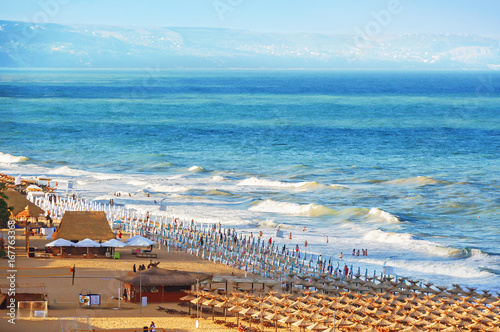 Resort Golden Sands Bulgaria panorama of the beach and the sea shore with beautiful waves with white foam. Panoramic view Golden Sands Bulgaria.