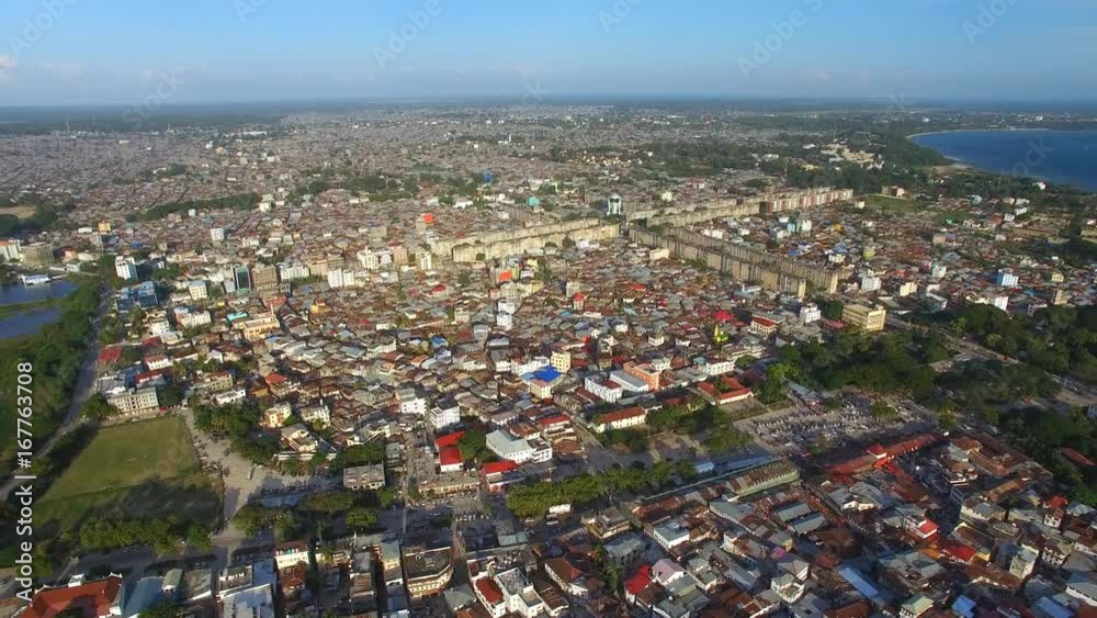 Aerial view of the Stone Town, old part of Zanzibar City, main city of Zanzibar, Tanzania from above, Africa, Indian Ocean, 4k UHD Aerial view of the Stone Town, old part of Zanzibar City, main city of Zanzibar, Tanzania from above, Africa, Indian Ocean, 4k UHD