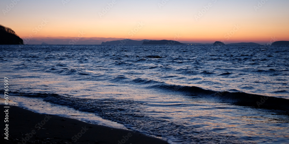 Sunset in the sea, dark evening