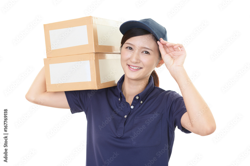 荷物を運ぶ女性労働者 荷物を運ぶ女性労働者