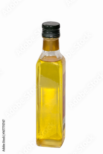 the glass bottle of oil on white background