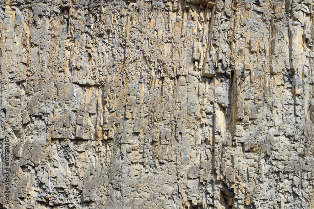 rock face / cliff at a quarry - irregular stone pattern