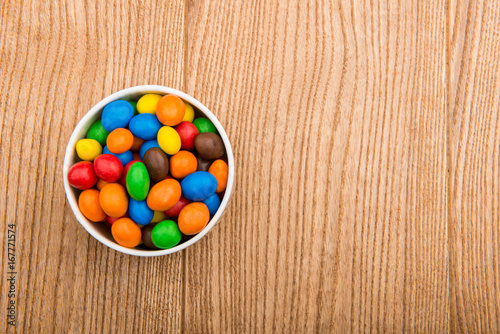 Colored sweets in chocolate