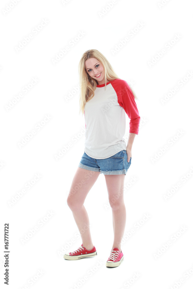 full length portrait of a blonde girl wearing casual t-shirt and denim shorts. isolated on white background. full length portrait of a blonde girl wearing casual t-shirt and denim shorts. isolated on white background.