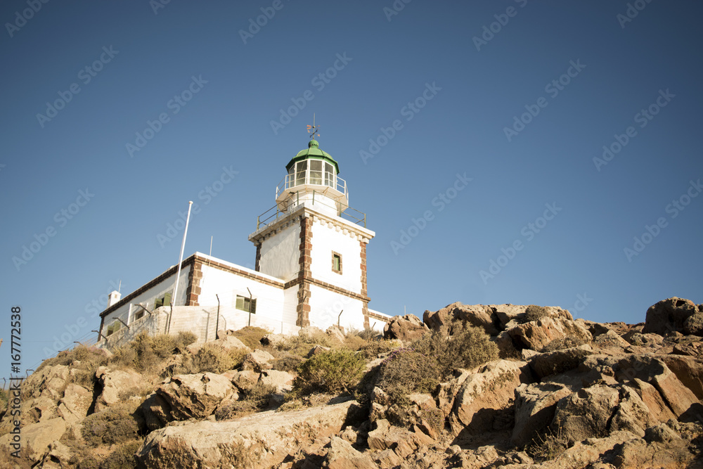 Lighthouse on Side of Cliff