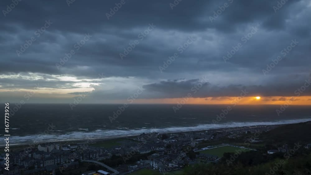 Stormy Sunset Sky over Coastal Town in Barmouth Time Lapse Stormy Sunset Sky over Coastal Town in Barmouth Time Lapse