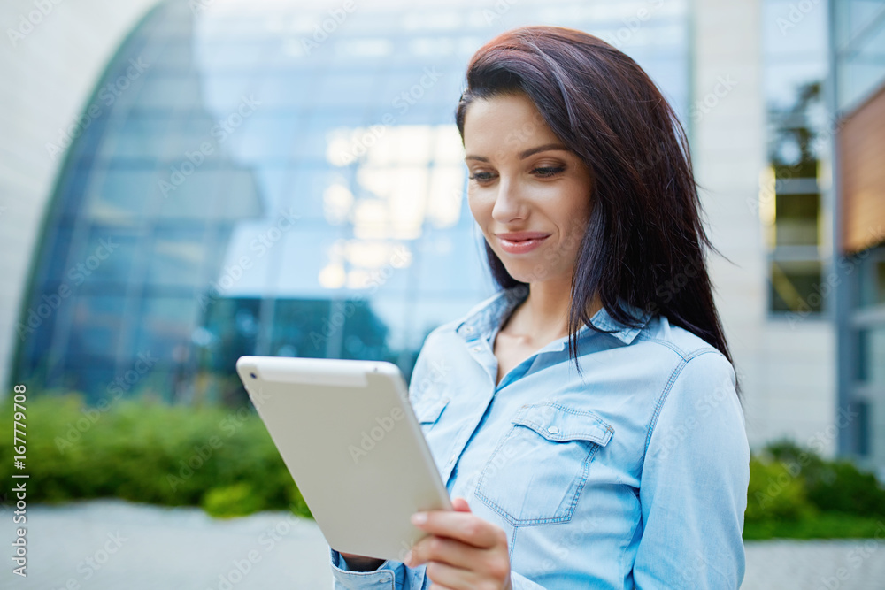 Smiling young pretty woman with tablet. Smiling young pretty woman with tablet.