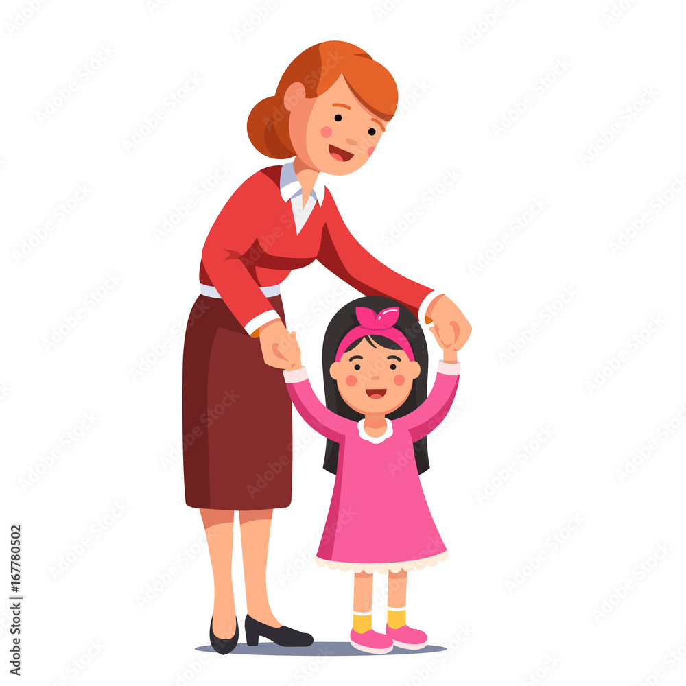 Mum walking with little daughter holding her hands Mum walking with little daughter holding her hands