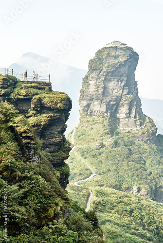 Tourists at Mount Fanjing rock formation, Jiangkou, Guizhou, China photo