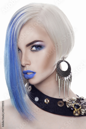 Girl with colored hair and make-up photo