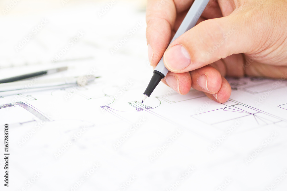 architect working drawing construction plans architect working drawing construction plans