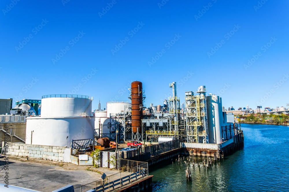 Elevated view of industrial biofuel plant on river waterfront Elevated view of industrial biofuel plant on river waterfront