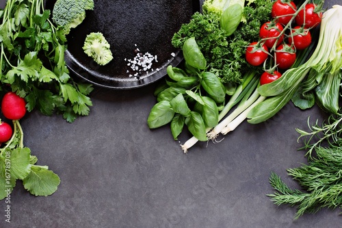 Obraz na plátně Seasonal green vegetables and herbs