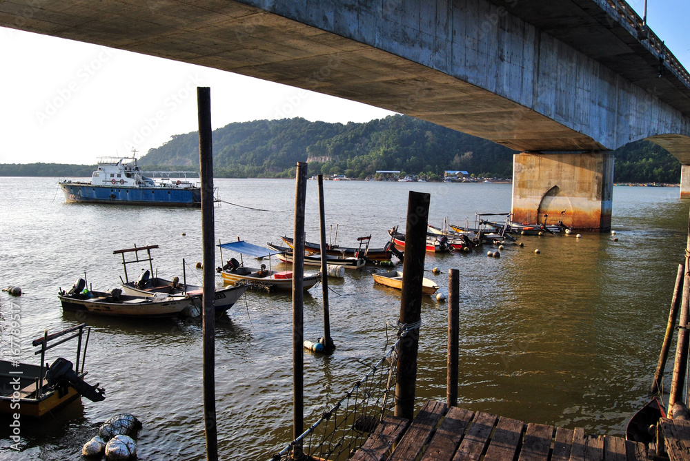 Boats under bridge