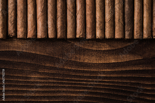 Cuban cigars close up on wooden table