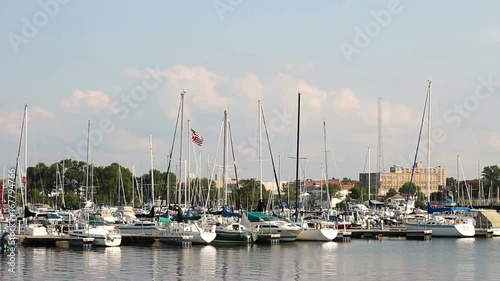 Boats at a docking bay near cleveland ohio in summertime photo