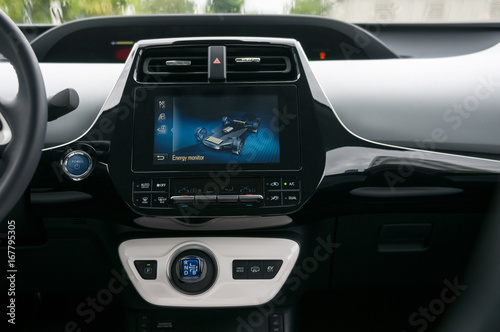 Hybrid car interior with infotainment system. © vpilkauskas