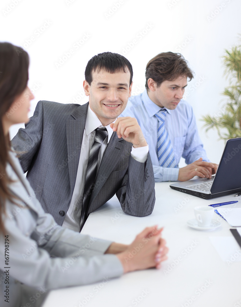 Manager and colleagues in the workplace Manager and colleagues in the workplace