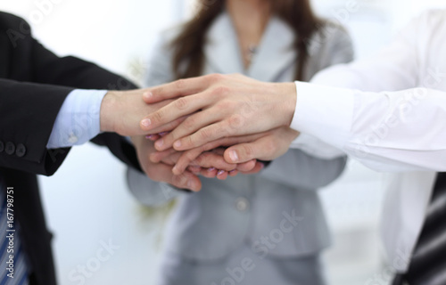 closeup: hands business team stacked together