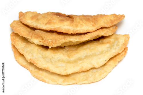 Cheburek - traditional dish of many Turkic and Mongolian peoples, isolated on white background