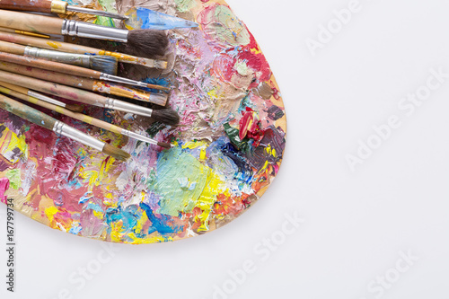 Art palette with colorful paint strokes, isolated
