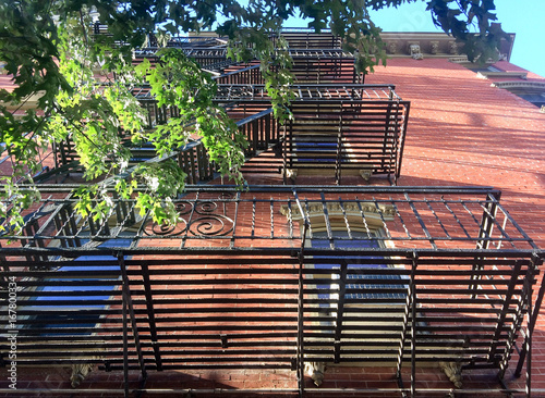 exterior building with iron stairs in manhattan, New York
