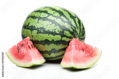 watermelon with slices standing isolated on white background