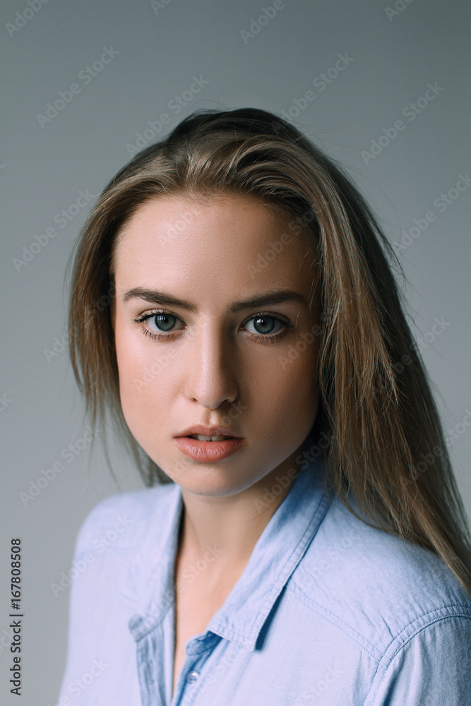 Girl with beautiful face and beautiful sports figure on a white background Girl with beautiful face and beautiful sports figure on a white background
