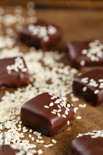 Handmade chocolate candies with sesame seeds