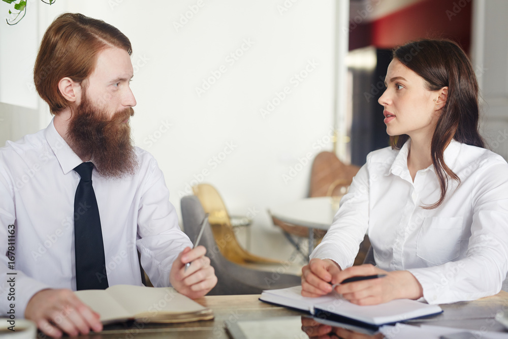 Negotiation of two business leaders or employers at meeting Negotiation of two business leaders or employers at meeting