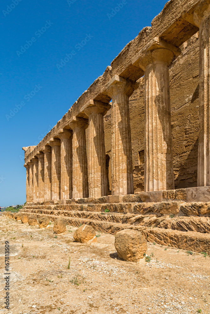Fototapeta premium Agrigento, Italy - Valley of the Temples is an archaeological site in Sicily, southern Italy. The area is included in the UNESCO World Heritage Site list.