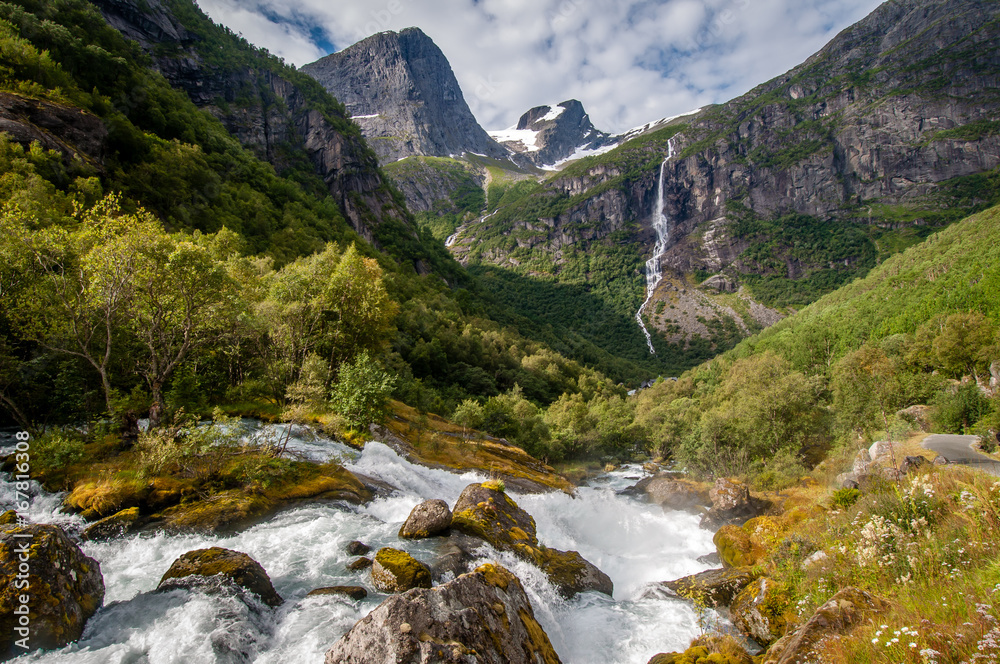 Waterfall and a river in the briksdalbreen in Norway.