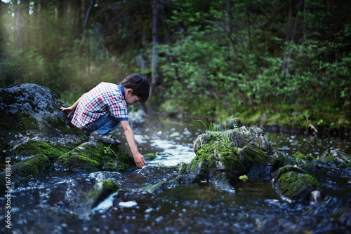 The boy by the stream