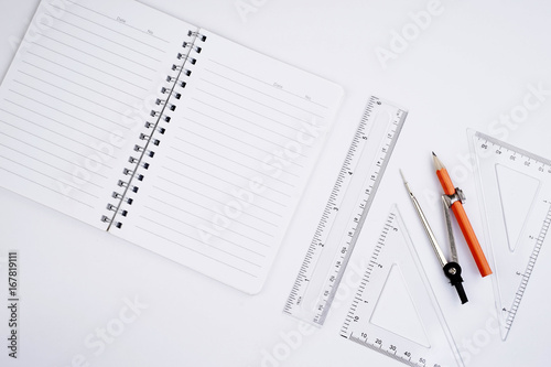 Back to School concept. Studying elements on a white background in a top view or flat lay