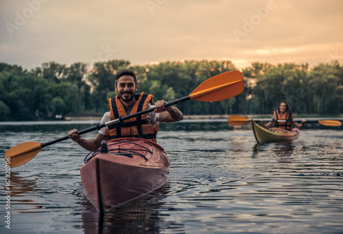 Couple travelling by kayak