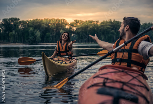 Couple travelling by kayak