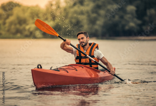 Vászonkép Man and kayak