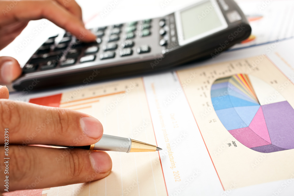 Closeup of a businessman accounting Closeup of a businessman accounting