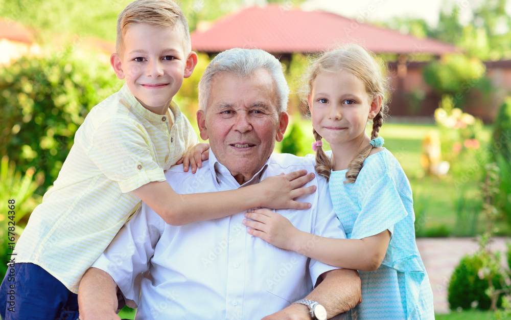 Portrait of happy old grandfather and cute children Portrait of happy old grandfather and cute children