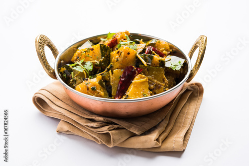 Popular indian main course vegetable Pumpkin dry curry or kaddooor kaddu ki sabzi in hindi, lal bhopla chi bhaji in marathi, selective focus

