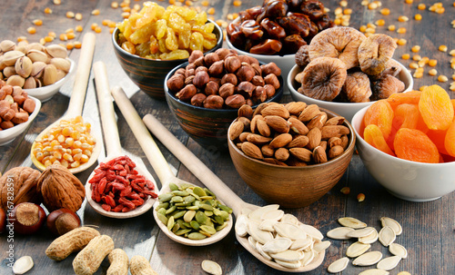 Fotografie Composition with dried fruits and assorted nuts