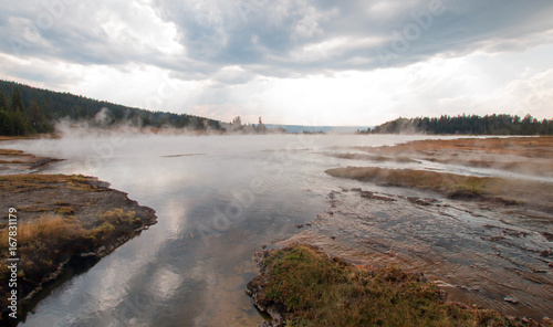 Hot steam rising off Hot Lake in the Lower Geyser Basin in Yellowstone National Park in Wyoming United States