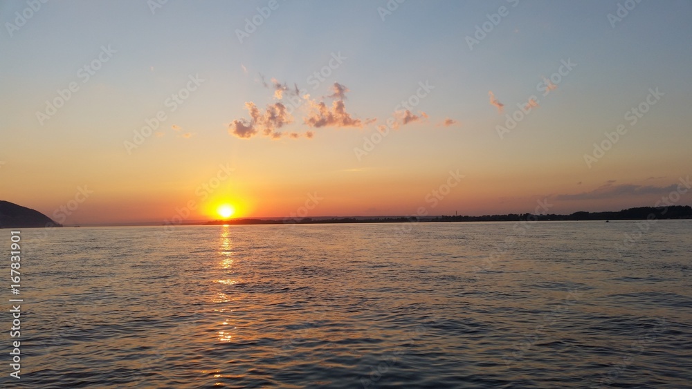 Beautiful sunset sunset on a river with clouds Beautiful sunset sunset on a river with clouds